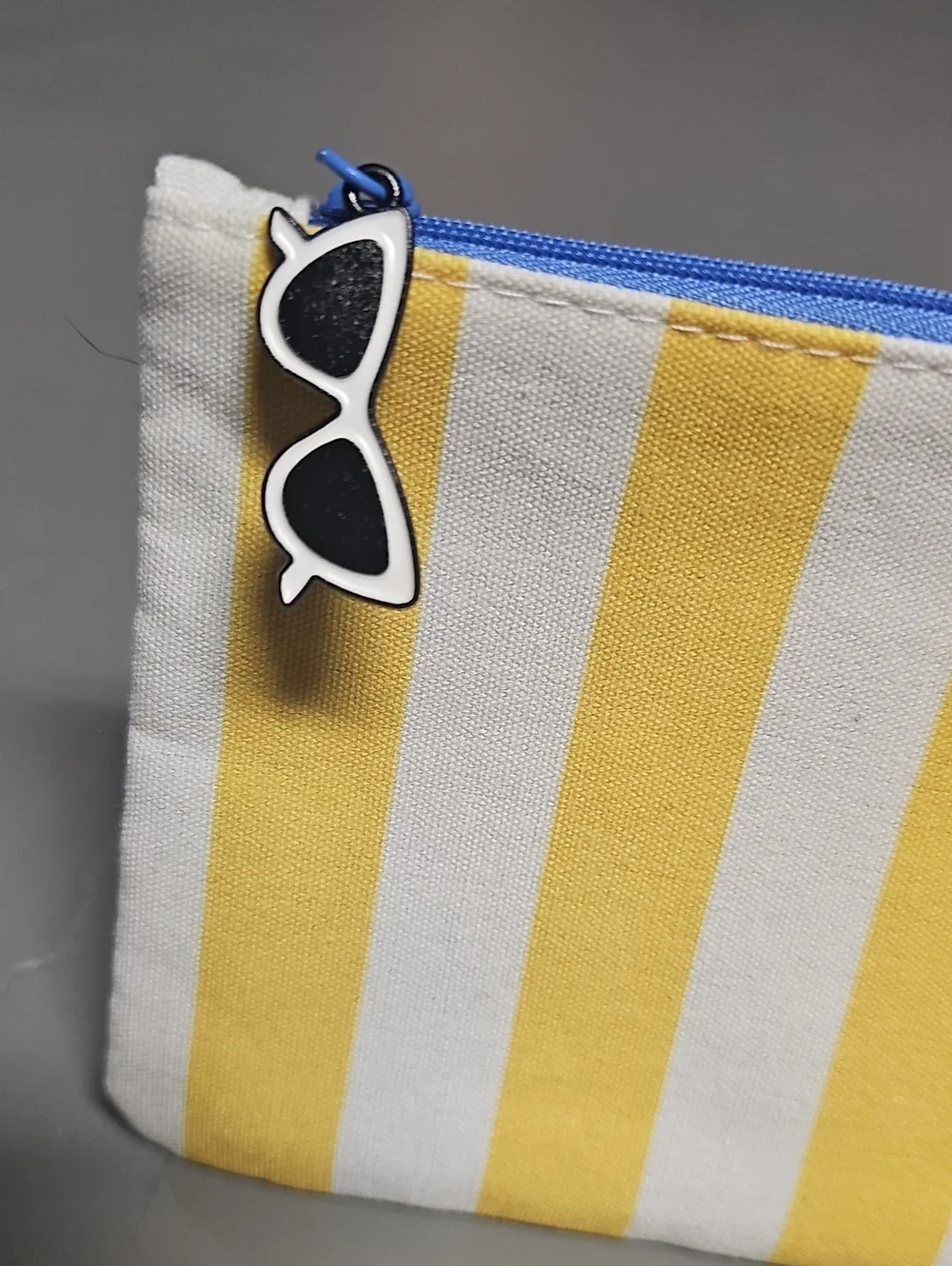 IPSY Glam Bag July 2026 Yellow & White Stripes Beach Theme